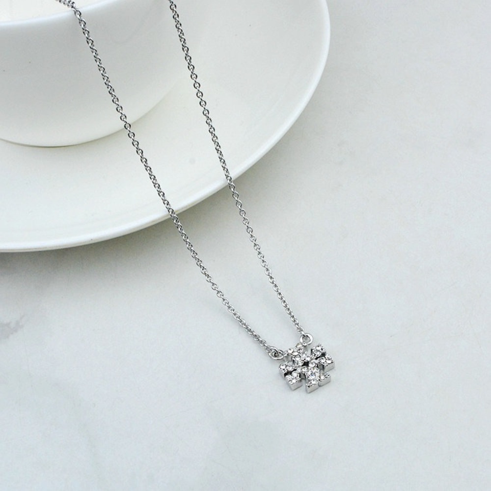 Tory Burch Elegant Silver Necklace with Crystal Accents